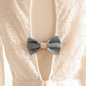 Blue and gold bra staples knot