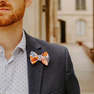 Orange and blue printed pin's UNISEX image 1