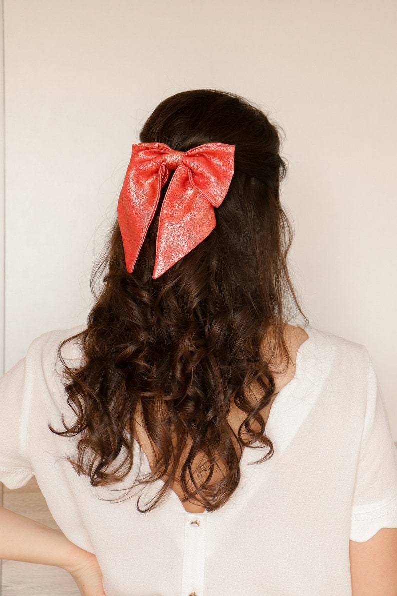 Maxi bow barrette in iridescent coral crepe image 1