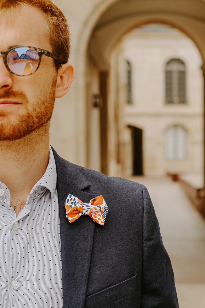 Orange and blue printed pin's UNISEX image 1