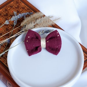 Minus, minus. Bow barrette crocodile claw in double burgundy gauze