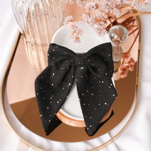 Maxi black and gold barrette bow