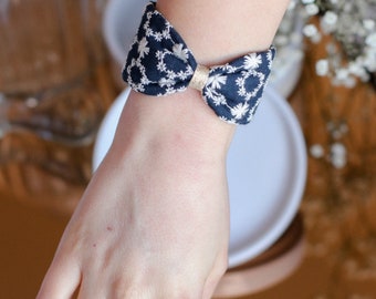 Bow cuff in navy blue and white embroidery fabric