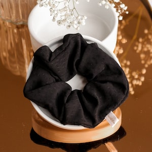 Chouchou black jacquard polka dot glossy