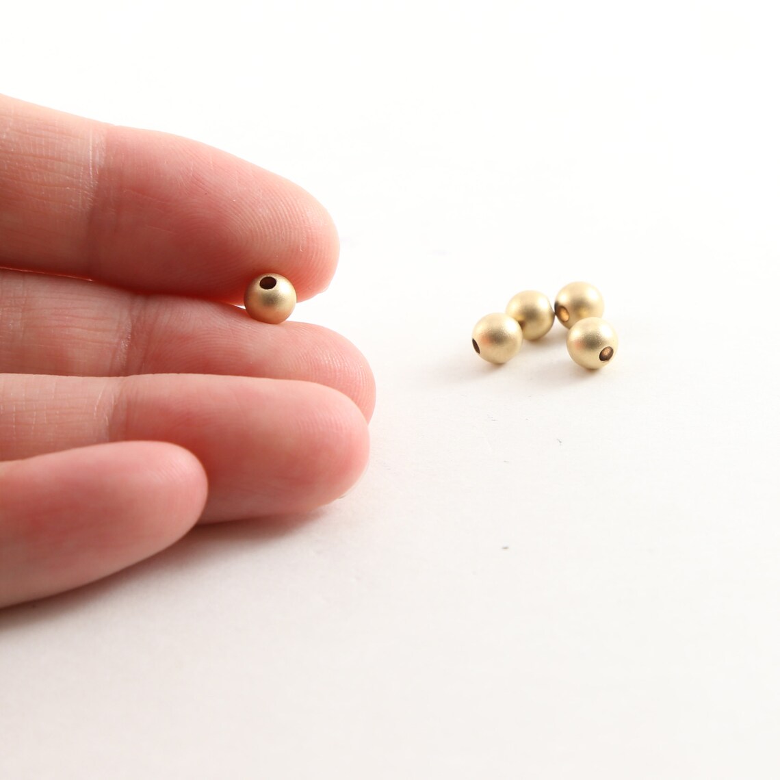 thumbnail image 2 of Beadtifulstyle 6pcs 5mm 14K Gold Filled Seamless Round Smooth Spacer Beads 2 of 5