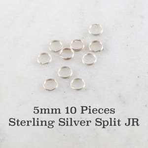 May include: Ten silver 5mm split jump rings. These rings are perfect for jewelry making and crafting.
