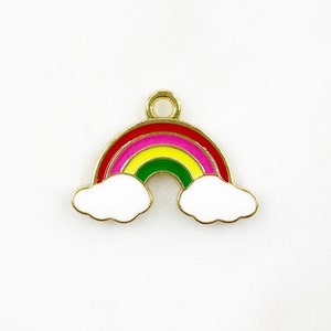 May include: Gold-tone rainbow charm with white enamel clouds. The rainbow has red, pink, yellow, green, and blue enamel.