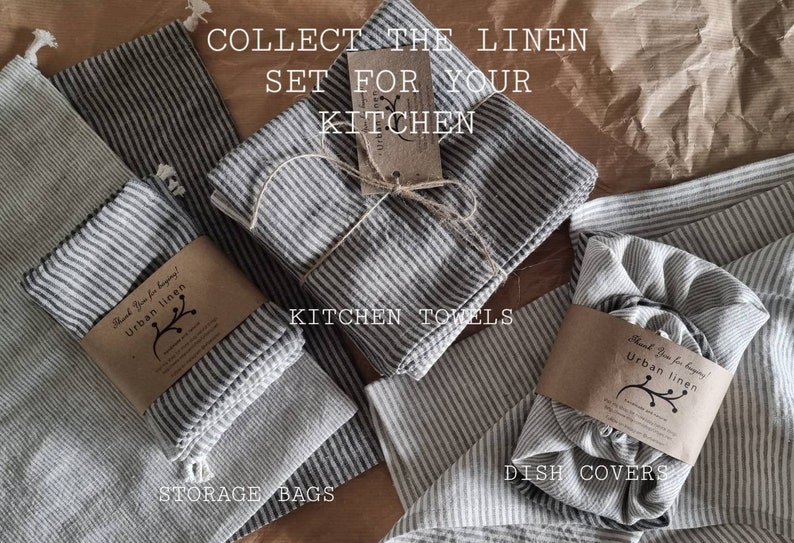 May include: A set of striped linen kitchen towels, storage bags, and dish covers. The towels are tied together with twine and a tag that reads "Collect the linen set for your kitchen". The bags and covers are folded and arranged on a brown paper background.