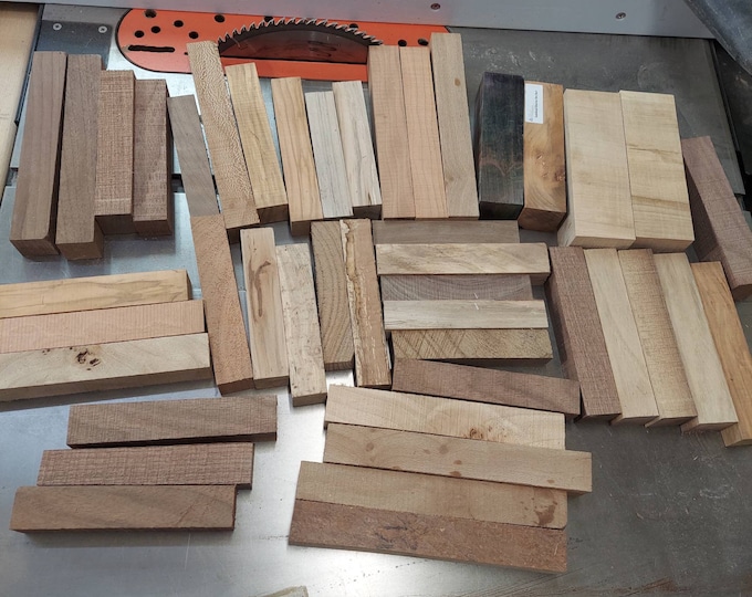 Medium flat rate box of 1"×1"×5" blanks. Mixed species.