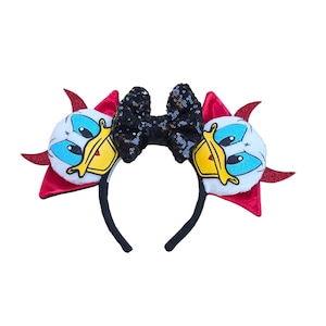 May include: A black headband with a sequined bow and two Daisy Duck character ear decorations. The ear decorations feature Daisy Duck's face with red accents and a red bow. The headband is a fun accessory.