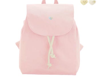 Mochila pequena de algodão orgânico com estampa de coração e flor, ideal para presente de aniversário ou para uso escolar.