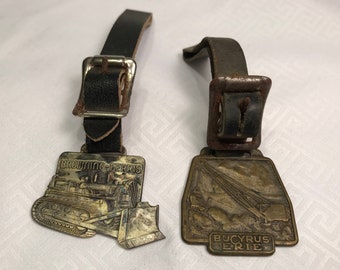 2 Browning-Ferris Machinery Co./Bucyrus Erie Watch Fobs