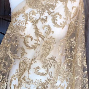 Gold embroidered floral bridal lace fabric 60” wide price 1 yard