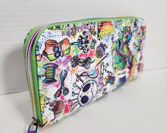 Cartera con cremallera y costuras divididas de pesadilla