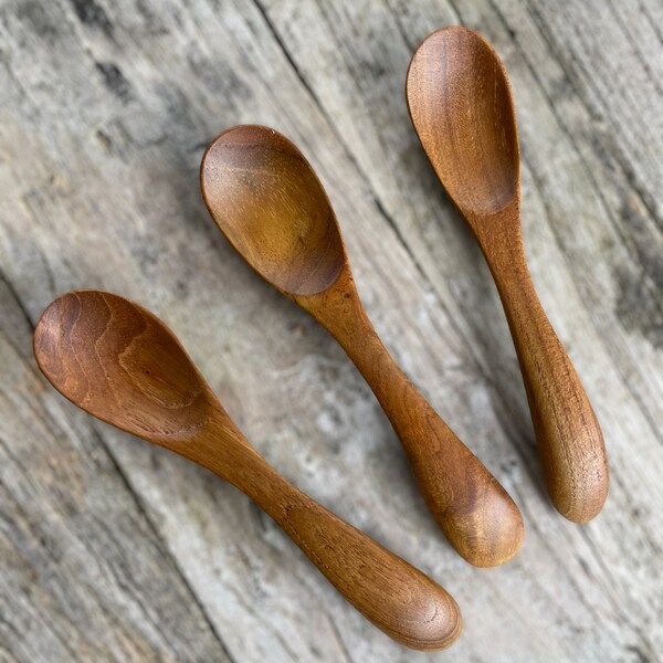 Small wooden tea spoon for serving herbs, salt, eggs or jam