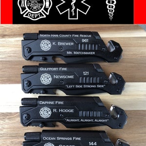 May include: Four black multi-tool knives with a fire department emblem, a name, and a number engraved on each. The knives have a built-in seatbelt cutter and window breaker.
