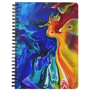 May include: Spiral-bound notebook with a vibrant abstract design. The cover features a swirling pattern of blues, yellows, oranges, and reds, creating a dynamic and colorful visual. The notebook has a black spiral binding.