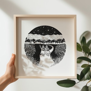 May include: Black and white illustration of two figures walking on a path through a forest under a starry sky. The illustration is framed in a light wood frame.