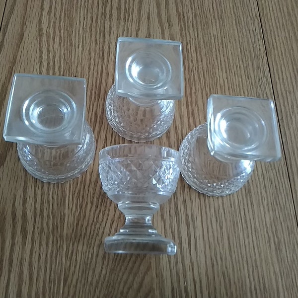 A matching set of 4-3 oz square based aperitif stemmed or cordial stemmed glasses with a diamond designed bowl.  Bar 1026