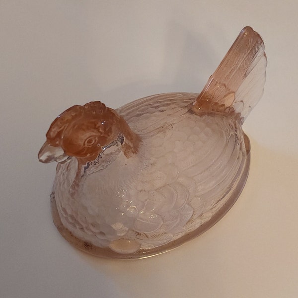 A hallmarked Imperial Glass pink hen only with a split tail.  It is the top portion of the candy dish of a " Hen on a Nest".  Misc 1351