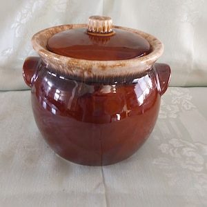 The sweetest 7.5" bean pot in a brown stoneware pottery white drip glaze with lid and handles bean pot.  SW 320