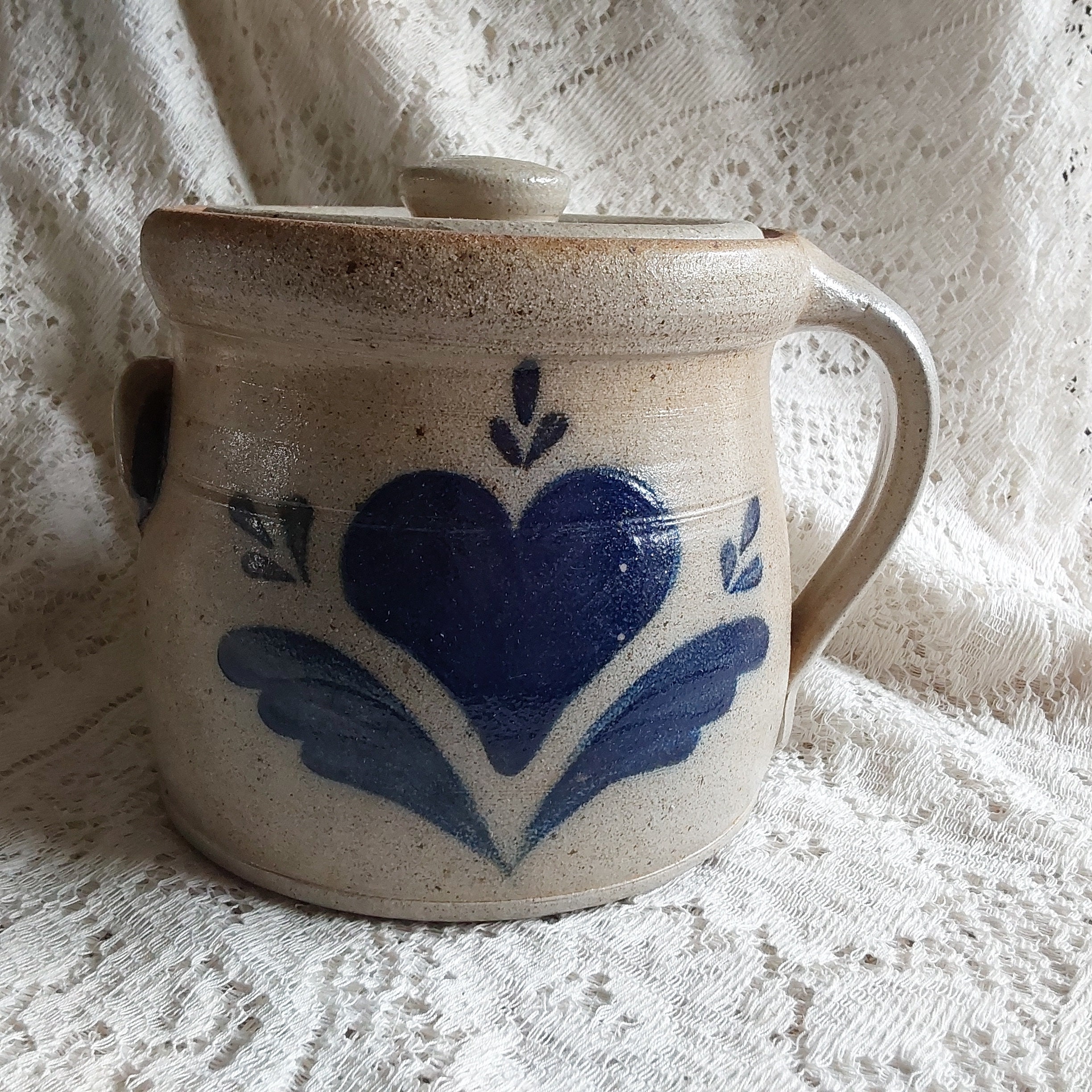 Marked Handmade Rowe Pottery Works 1986 is a One Handled 7