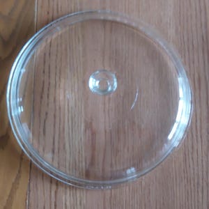 Glass Pyrex round replacement lid that is marked 626-C A-19 is 10.25" across for 3 quart for Pyrex or Corning Ware dish 26 or 26-T.  CD 291
