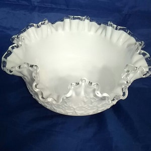 Unmarked Fenton double ruffled, silver crest pedestal bowl in the Spanish Lace pattern.  MG 234