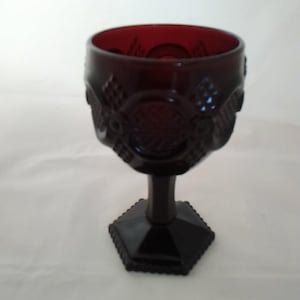 From the Avon Ruby Red Cape Cod Collection, a large 6" tall water goblet, with 21 available to purchase.  Avon 31