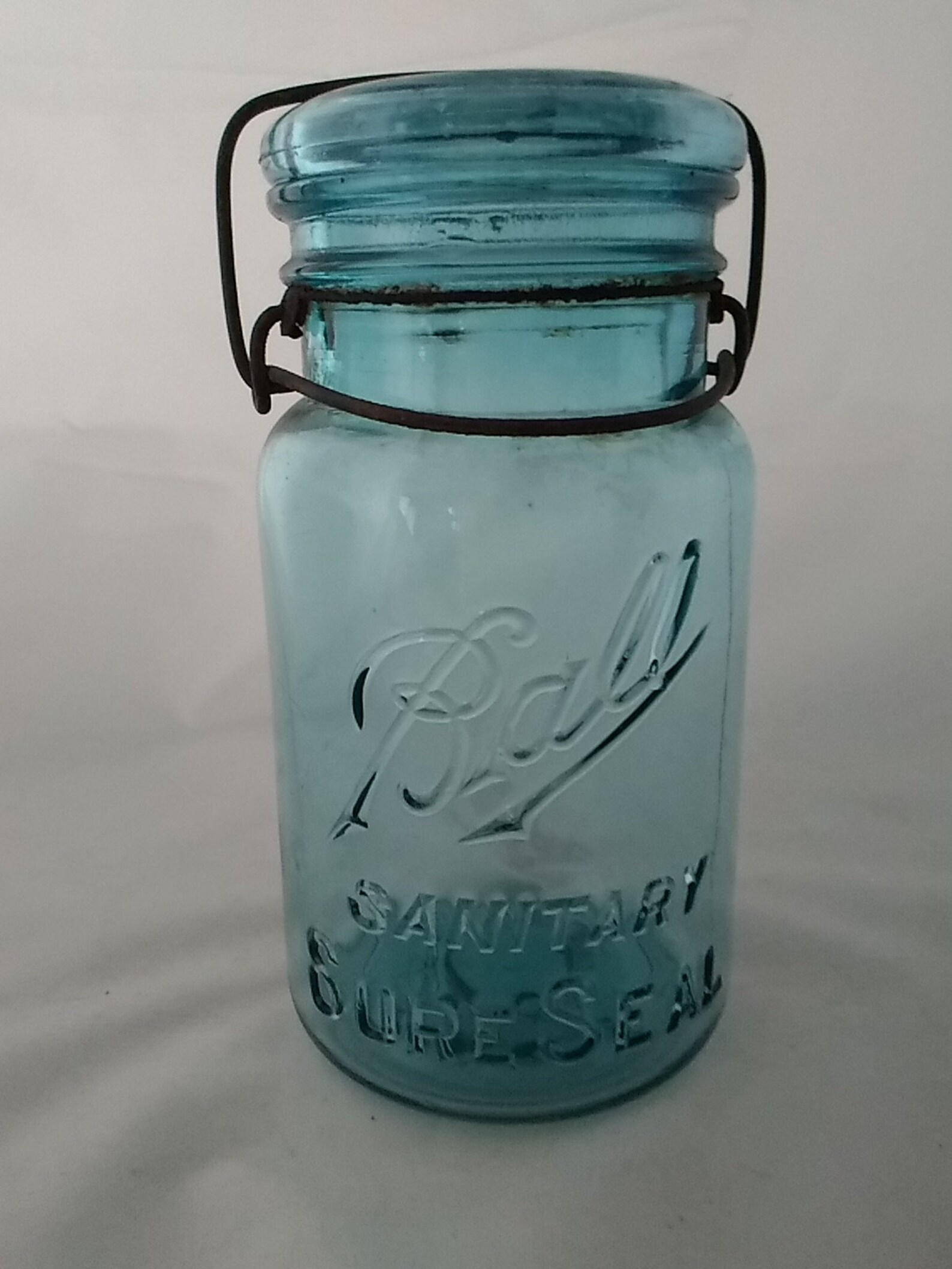 A blue Ball Sanitary Sure Seal quart canning lid Etsy
