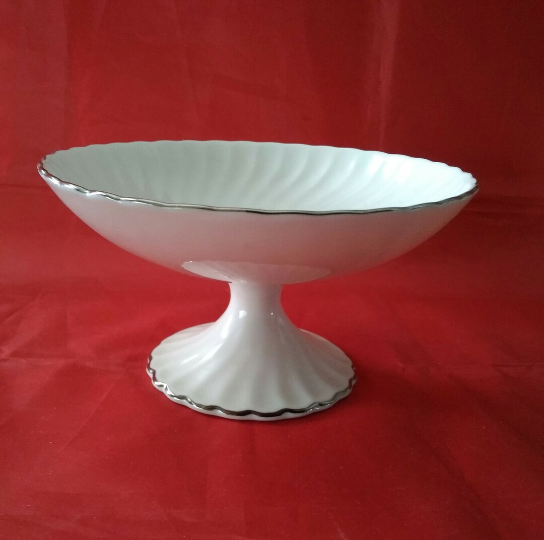 A Porcelain Pedestal Swirled Dish With Silver Platinum Trim. Etsy