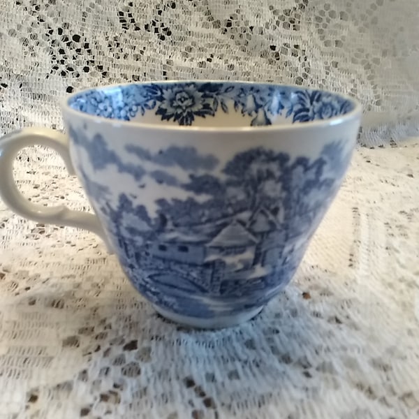 A Meakin 7 oz blue transferware cup the English Countryside design.  CS 296