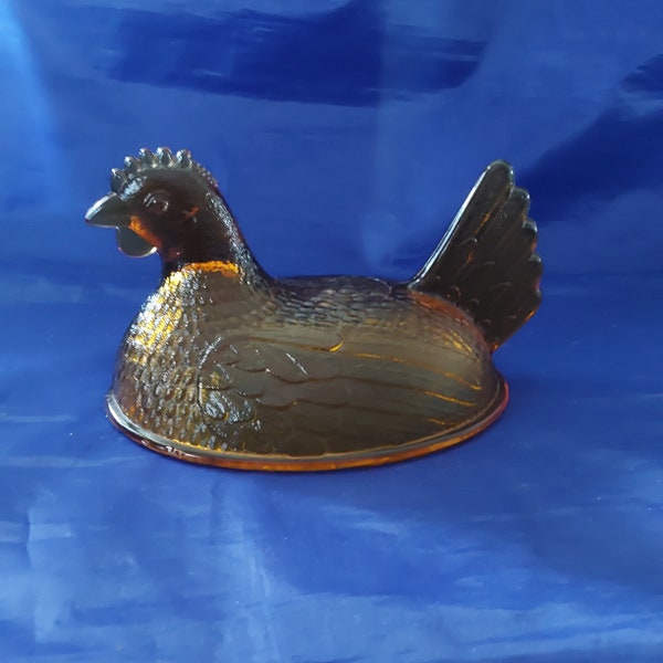 By Indiana Glass, an amber hen only from hen on a nest with no chips or cracks.  Misc 1349