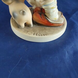 A vintage Farm Boy with Piglets-number 66, marked M J Hum on the top and "V" with a bee-W Germany blue backstamp 1960s. Misc 2051 image 5