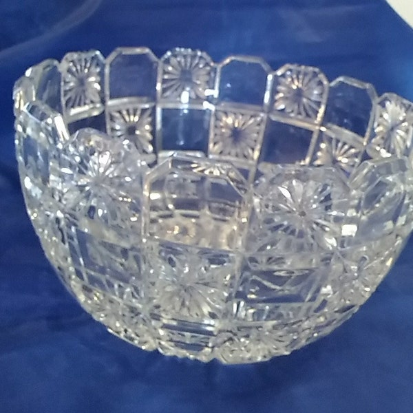 A very large lead crystal trifle bowl with a checkerboard design with flowers in alternating squares and a squared tooth rim.  Bowl 862