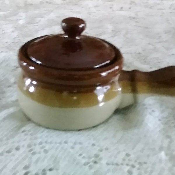 A stoneware tri-colored of beige, tan and brown , handled 10 oz soup bowl crock with matching brown lid.  SW 248