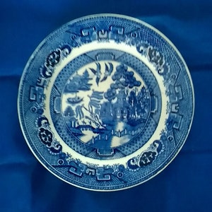 A Petrus Regout Maastricht Willow design luncheon 9 inch plate from Holland.  Plate 614