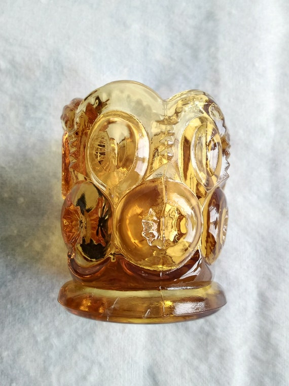 By LE Smith is an Amber Colored Glass Toothpick Holder in the Etsy
