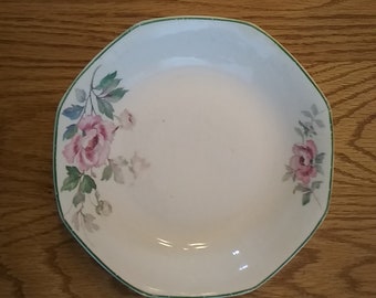 A Homer Laughlin Octagon shaped (8 sided) soup or salad bowl with a pink wild rose Yellowstone pattern, trimmed in green.  HL 91