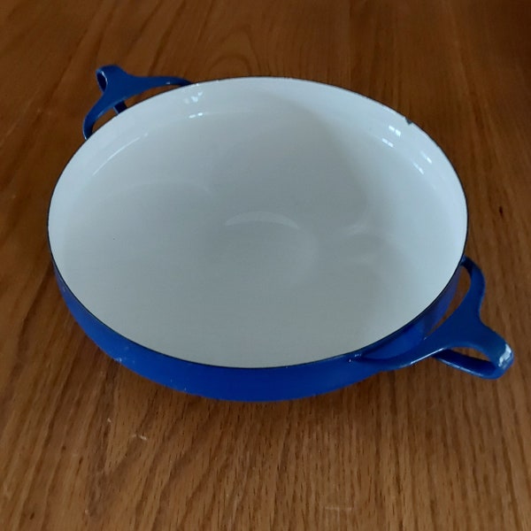 A 10 inch blue Dansk Kobenstyle Panella pan with white enamel interior from France that was previously owned.  Misc 1347