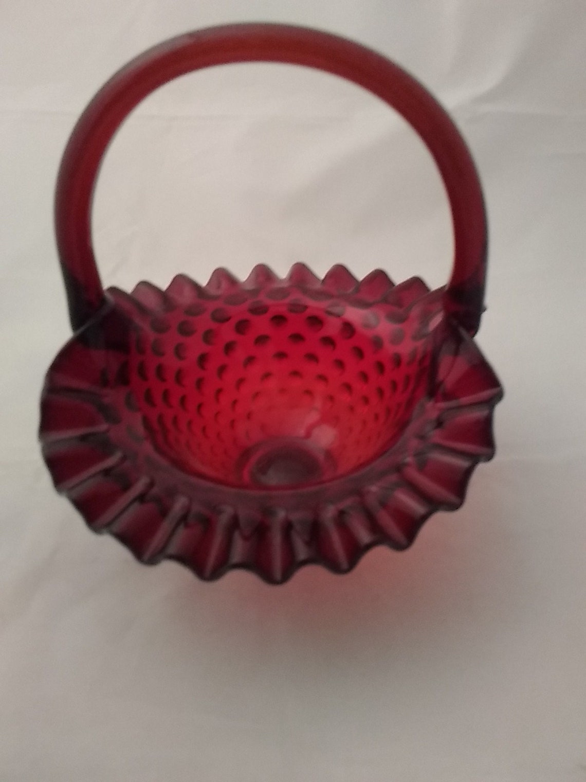 A red glass Fenton hobnail basket with handle. Misc 489 Etsy