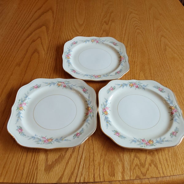 Set of 3-8" square salad/dessert plates in the Homer Laughlin Eggshell Nautilus Ferndale pink, orange with pink floral pattern .  HL 108