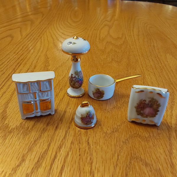 Lot of 5 Limoges France white porcelain with gold on a bell, bookcase, pan, lamp  wardrobe w/flowers or courting couples design. Mini 70