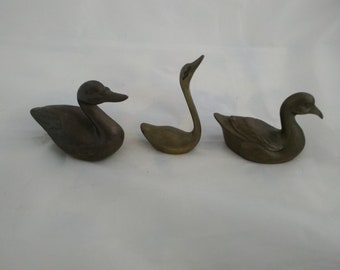 Set of 3 solid brass figurines.  Each is different.  Misc 581