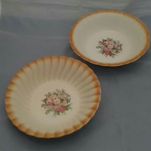 Set of 2-9&quot; large Homer Laughlin serving bowls with same orange rim and floral design, but different styles of the bowl. HL 17