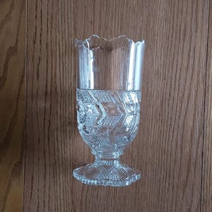 Early American Pattern Glass 7.5" Celery Vase by Jones, Cavitt & Co. Circa 1900's in a mitered diamond points, zig zag pattern. Dish 2158