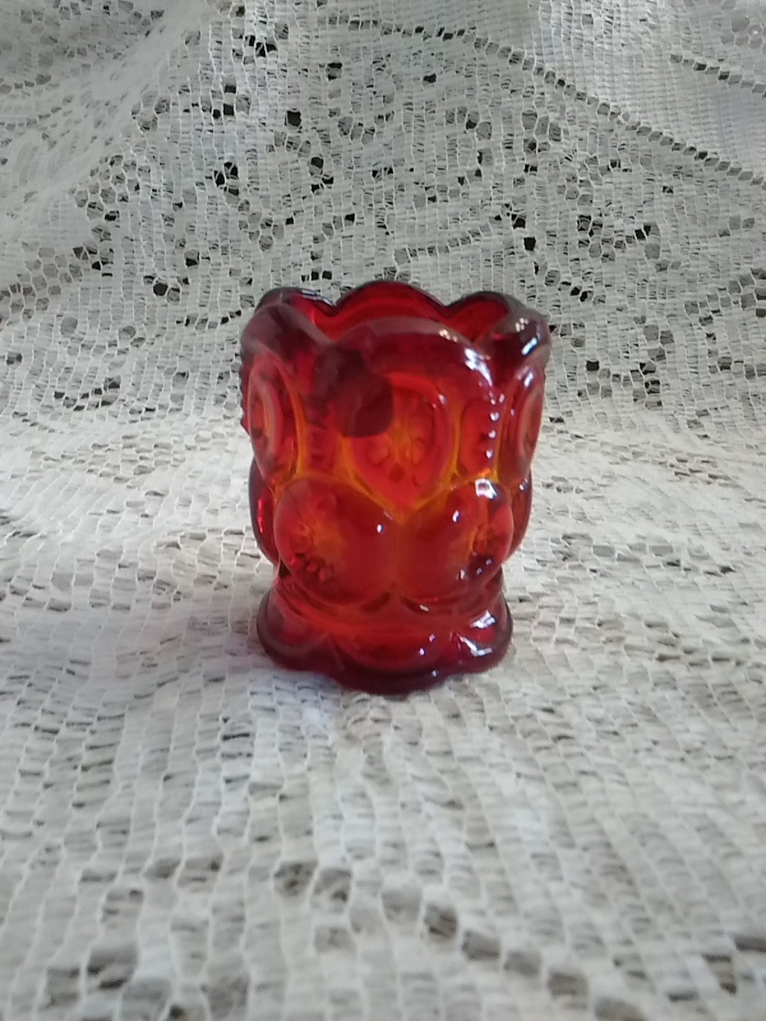 A LE Smith Amberina Colored Glass Toothpick Holder in the Moon and