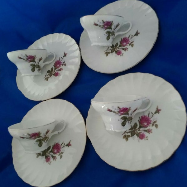 From Japan, a white china snack set for 4 in the moss rose pattern.  Dish 789