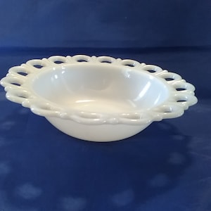 An Anchor Hocking Old Colony white milk glass serving bowl with an open lace wide rim.  MG 286