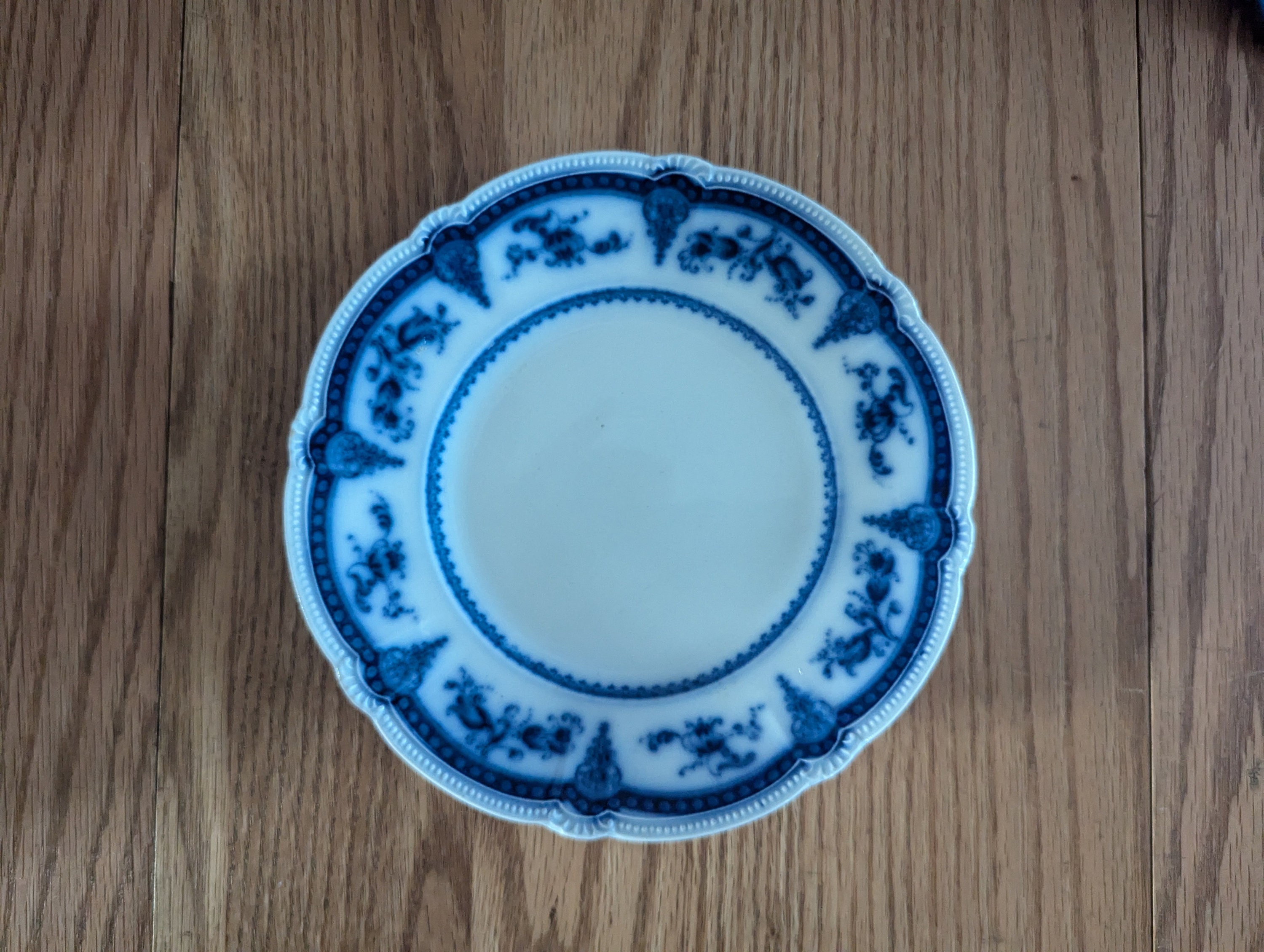 An Antique Flanders Booth Royal Semi Porcelain Flow Blue 7.25